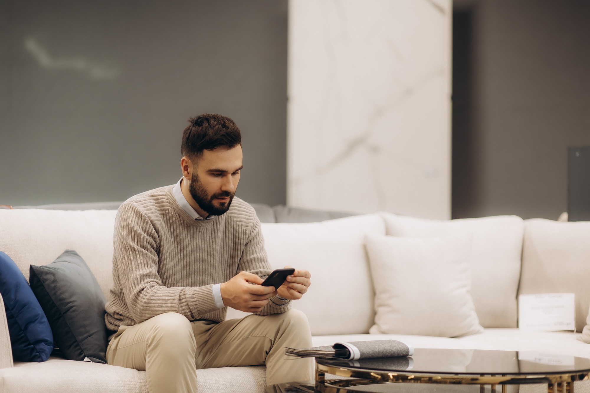 Male furniture seller consultation online. online furniture purchase