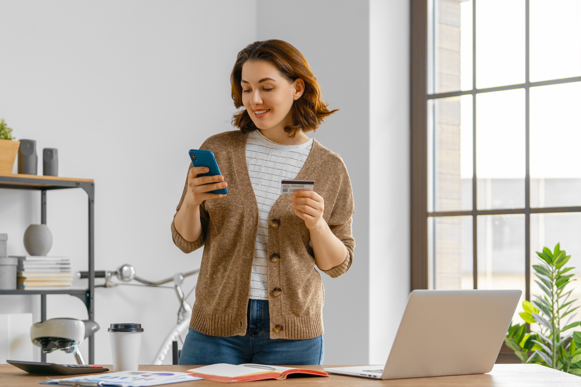Woman is doing online purchases